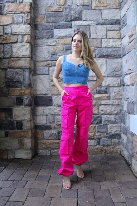 ShopJenny Boutique model is pictured wearing Alessia Cargo Joggers - Fuchsia made by Urban Daizy.