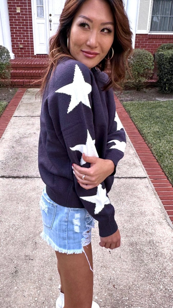 ShopJenny Boutique model is pictured wearing Hayden Star Sweater - Navy/White made by BaeVely.