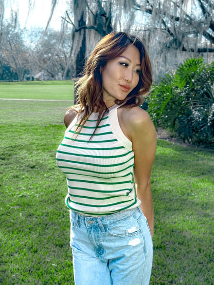 ShopJenny Boutique model is pictured wearing Sadie Striped Knit Top - Cream/Green made by Saints & Secrets.